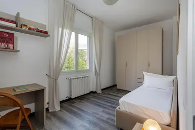 Letto o letti in una camera di Casa Nora by Wonderful Italy