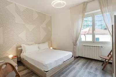 Letto o letti in una camera di Casa Nora by Wonderful Italy