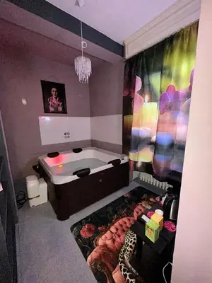 Letto o letti in una camera di Apartament Jacuzzi