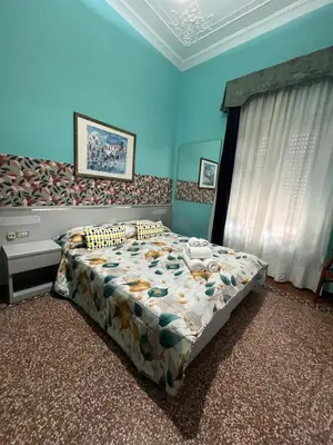 Letto o letti in una camera di Hotel & Garden
