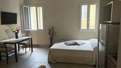 Letto o letti in una camera di Smartroom Lula di Correggio
