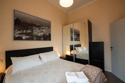 Letto o letti in una camera di Appartamenti Maggiore Parma