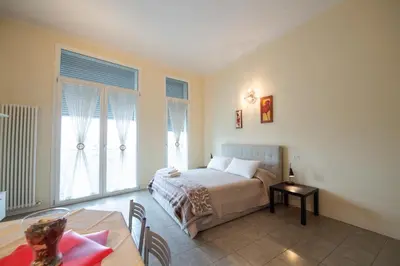 Letto o letti in una camera di Appartamenti Maggiore Parma