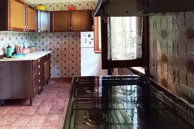 Cucina o angolo cottura di VILLA Amena WI-FI AC Giardino privato