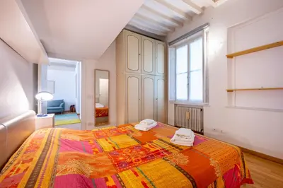 Letto o letti in una camera di GuestHost - Elegant & Bright Flat in Parma Center