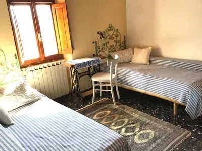 Letto o letti in una camera di La Codirossa - magnificent view