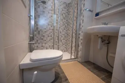 Bagno di 244B - Casa Ludo, Centro Storico,140m dalla Baia del Silenzio PATRIMONIO UNESCO spiaggia e mare