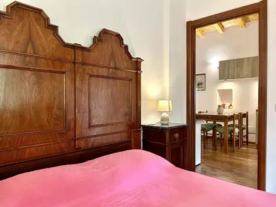 Letto o letti in una camera di CASA NINNO BERTIGARo