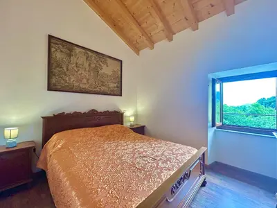 Letto o letti in una camera di CASA NINNO BERTIGARo