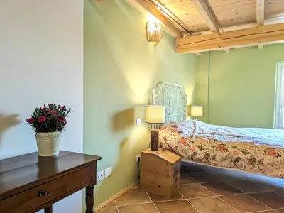 Letto o letti in una camera di CasaRosmarino
