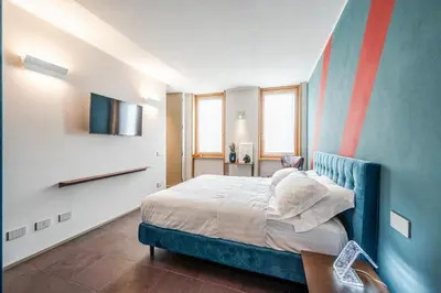 Letto o letti in una camera di FuoriPorta Affitti Brevi - Clodia - CaSanGiorgio104