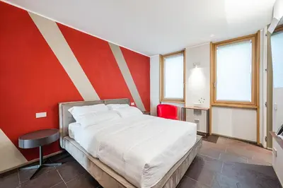 Letto o letti in una camera di FuoriPorta Affitti Brevi - Parigina - CaSanGiorgio104
