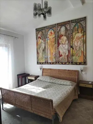 Letto o letti in una camera di Family house with garden