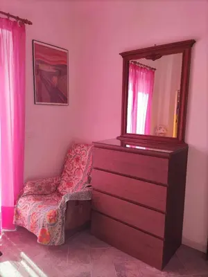 Letto o letti in una camera di Family house with garden