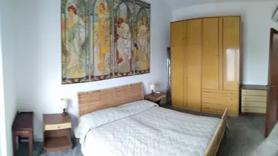 Letto o letti in una camera di Family house with garden