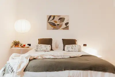 Letto o letti in una camera di Casa Lisa
