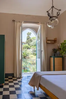 Letto o letti in una camera di Castello Canevaro
