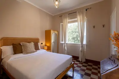 Letto o letti in una camera di Castello Canevaro