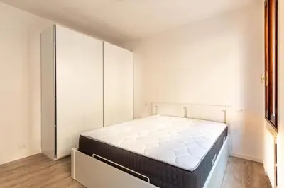 Letto o letti in una camera di Reggio Emilia - Centro storico