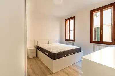 Letto o letti in una camera di Reggio Emilia - Centro storico