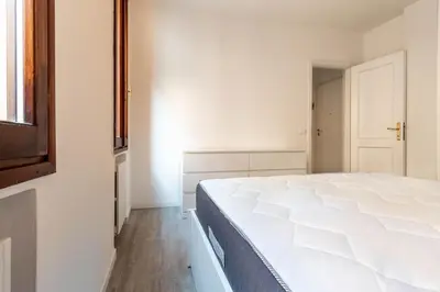 Letto o letti in una camera di Reggio Emilia - Centro storico