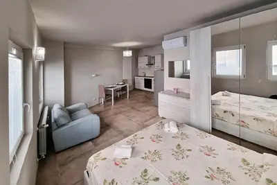Letto o letti in una camera di Nel cuore di Pavia -a pochi passi dalla stazione e dal centro