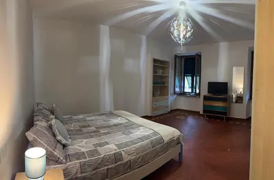 Letto o letti in una camera di Casa Paola