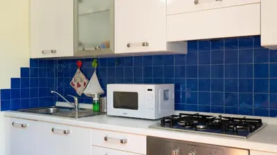 Cucina o angolo cottura di La Casetta nel Borgo a Due Passi dal Mare