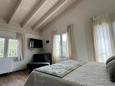 Letto o letti in una camera di La Valle degli Amici