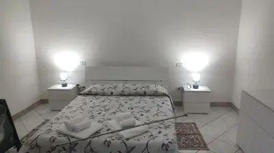 Letto o letti in una camera di Le dimore di Genny 2