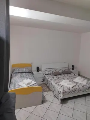 Letto o letti in una camera di Le dimore di Genny 2