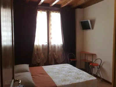 Letto o letti in una camera di Via Toscana House