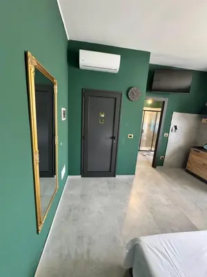 Letto o letti in una camera di Royal Bergamo