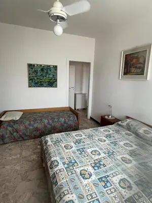 Letto o letti in una camera di Casa di Rita - Appartamento nel centro di Riva Trigoso vicino alla spiaggia