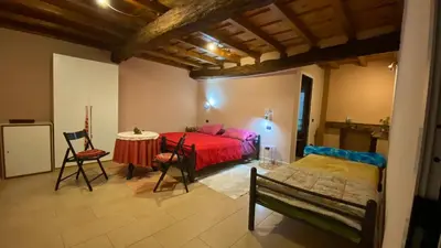 Letto o letti in una camera di Antica Cascina B&B