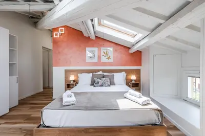 Letto o letti in una camera di Giardini 411 Rooms