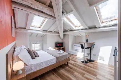 Letto o letti in una camera di Giardini 411 Rooms