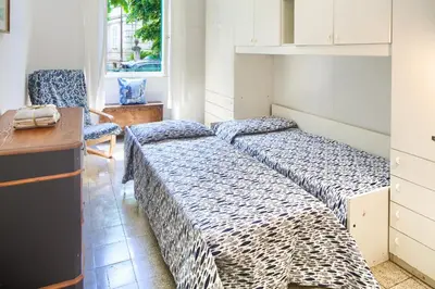 Letto o letti in una camera di Corso Roma 15 Vacanze