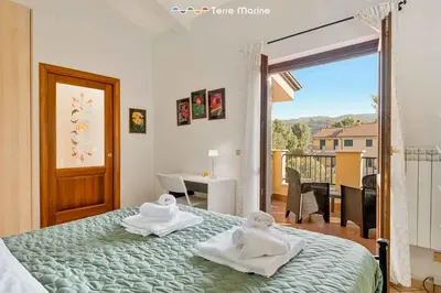 Letto o letti in una camera di Ape Maia, TerreMarine
