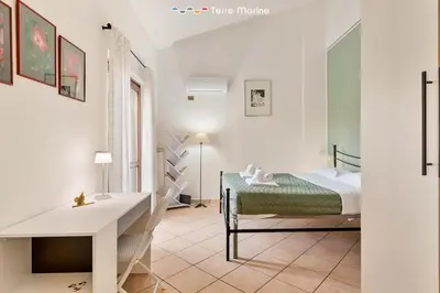 Letto o letti in una camera di Ape Maia, TerreMarine