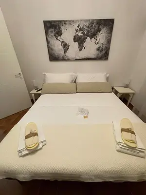 Letto o letti in una camera di La Casa Bianca by M&G