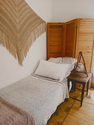 Letto o letti in una camera di Casa Artigena