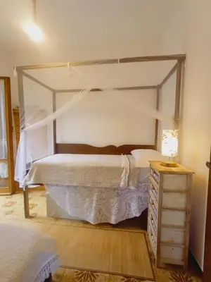 Letto o letti in una camera di Casa Artigena