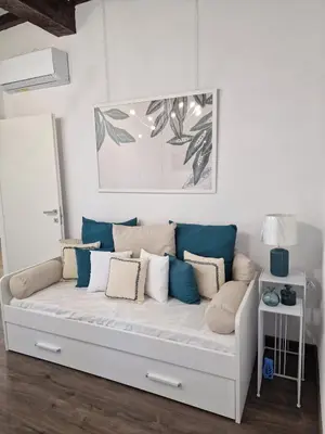 Area soggiorno di Cascina Robusta three-room apartment Box Private parking