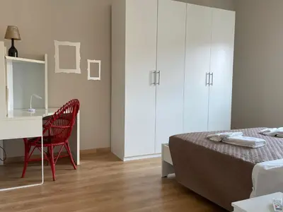 Letto o letti in una camera di Il Nido Sui Tetti