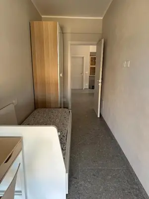 Letto o letti in una camera di Casa Itaca