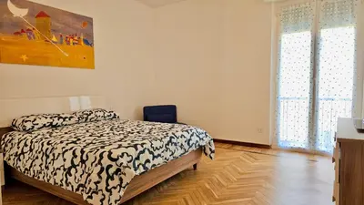 Letto o letti in una camera di Casa Ziblu a 5 minuti dal centro