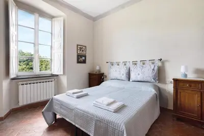 Letto o letti in una camera di AGRIFOGLIO - Palazzo Ravaschieri