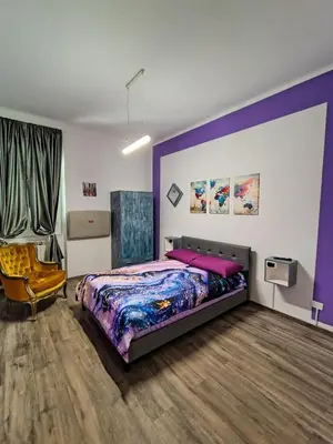 Letto o letti in una camera di L'angolo del Viaggiatore 5 Terre