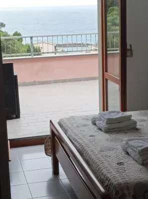 Letto o letti in una camera di Blue Horizon Apartment- 5 Terre